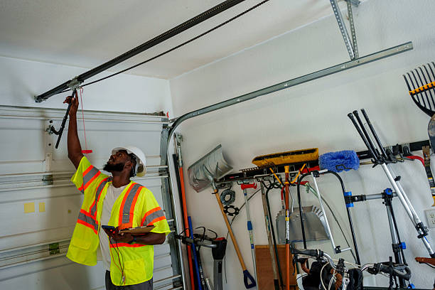 Professional Garage Door Panel Replacement technician working in Tinton Falls, NJ